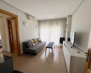 Sala d'estar de Apartament en venda en Benalmádena amb Aire condicionat, Terrassa i Moblat