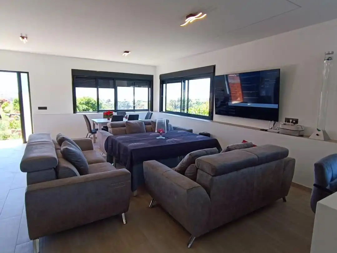 Sala de estar de Casa o chalet de alquiler en Nerja con Aire acondicionado, Calefacción y Jardín privado