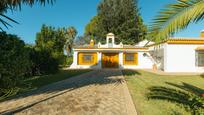 Exterior view of House or chalet for sale in Sanlúcar la Mayor  with Air Conditioner, Heating and Private garden