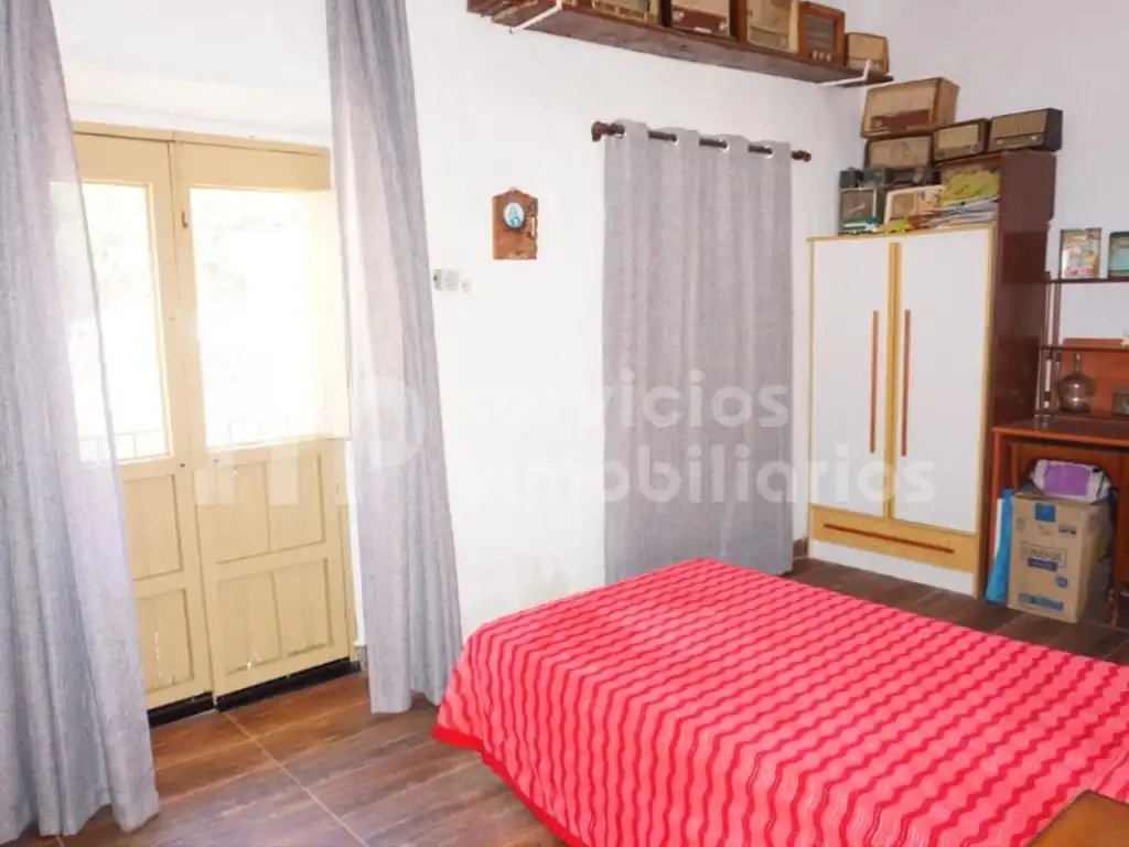 Habitación de Casa adosada en venta en Benamocarra con Jardín privado, Terraza y Amueblado