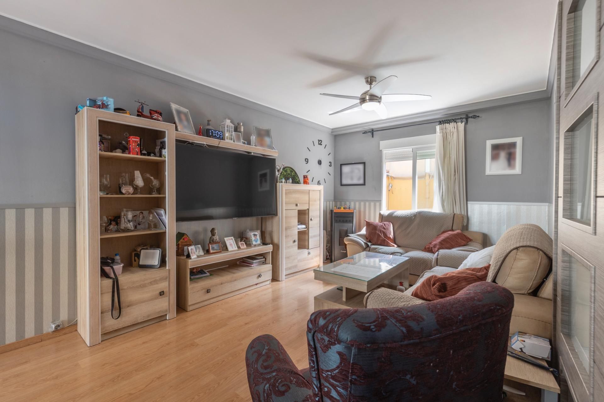 Sala de estar de Casa adosada en venta en Maracena