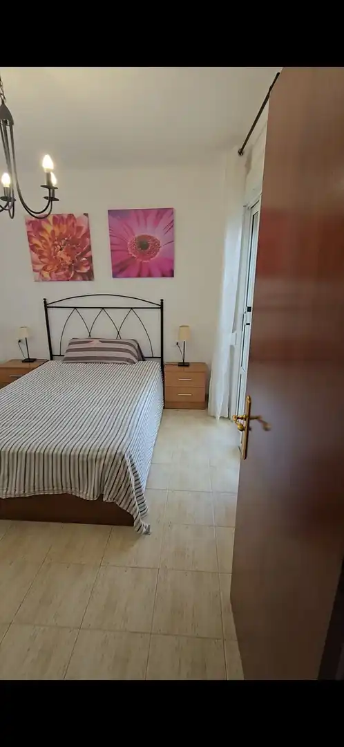 Dormitori de Apartament de lloguer en Adeje amb Piscina comunitària
