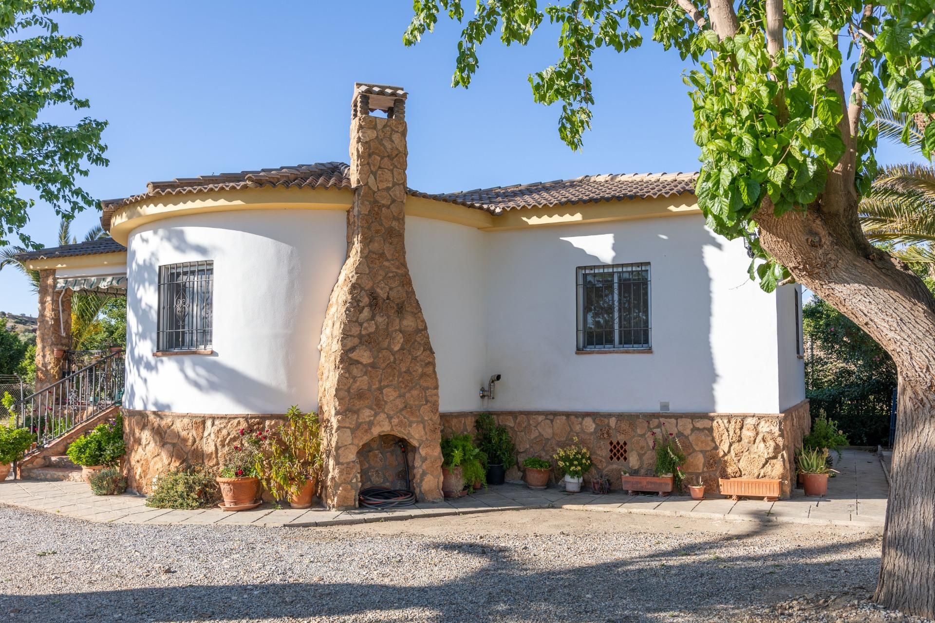 Exterior view of House or chalet for sale in Guadix  with Air Conditioner, Private garden and Community pool