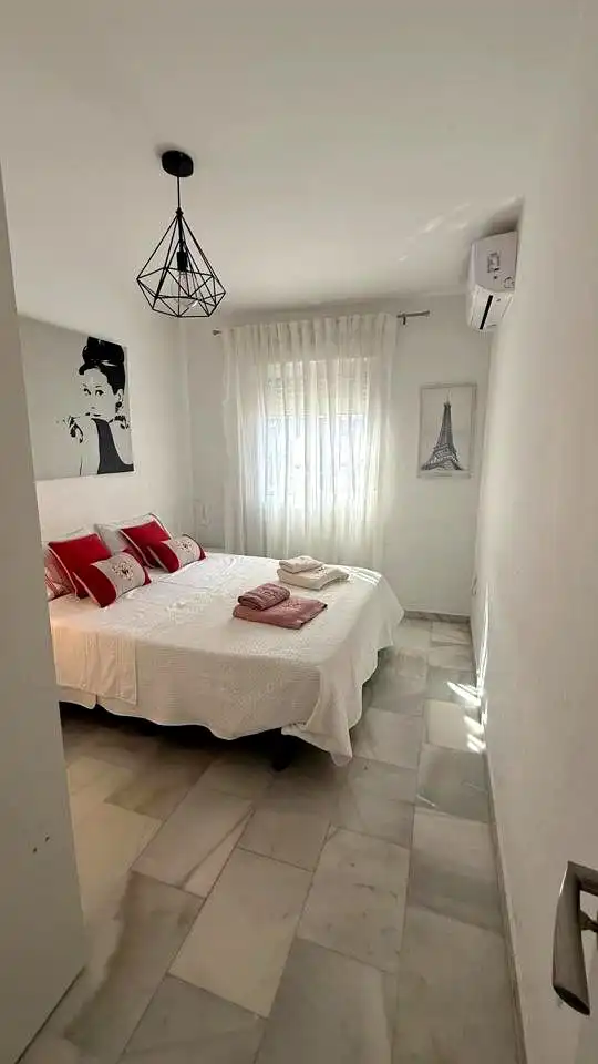 Habitación de Casa adosada en venta en Málaga con Aire acondicionado y Piscina comunitaria