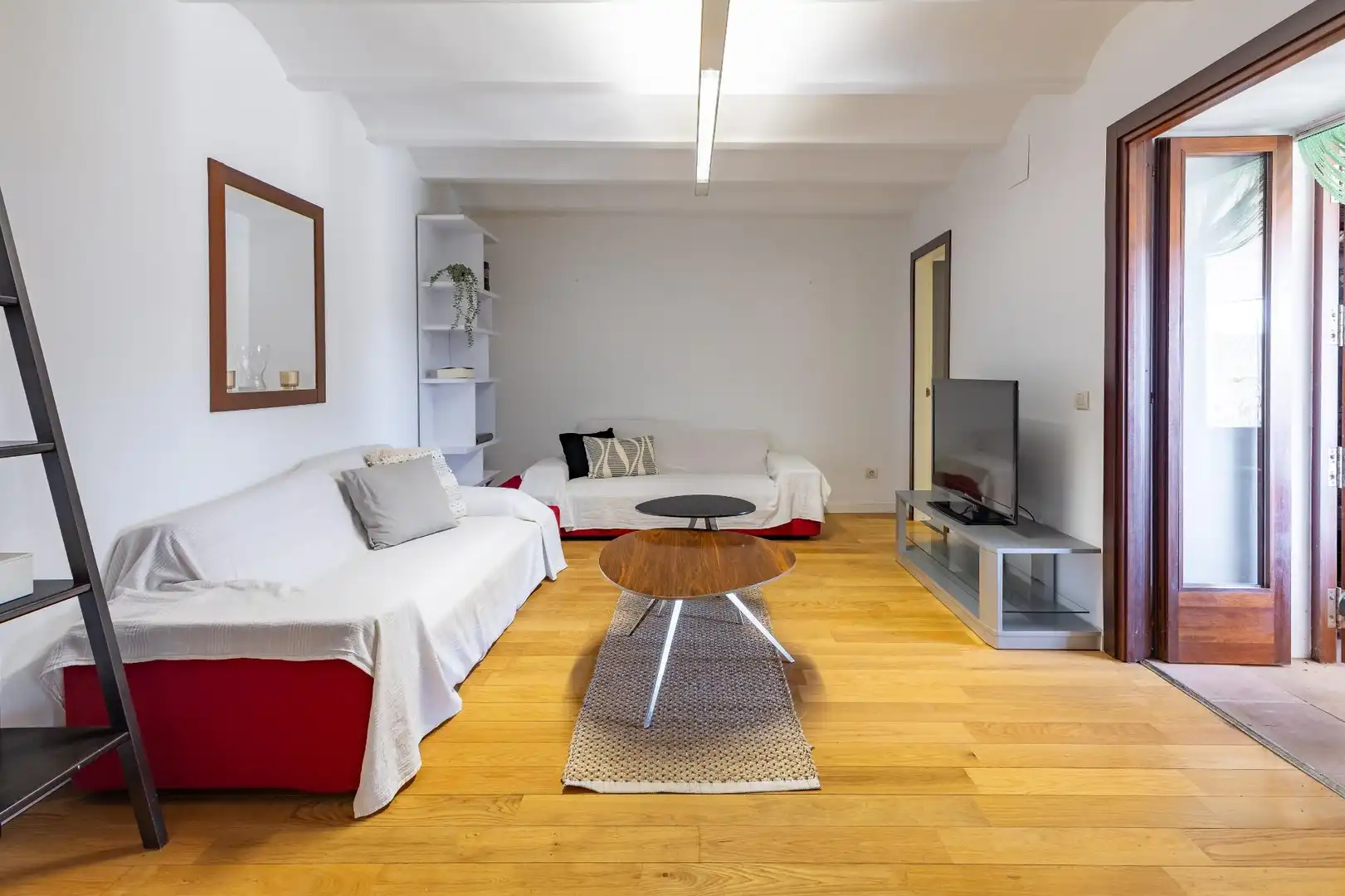 Sala de estar de Casa adosada en venta en Enguera con Calefacción, Terraza y Trastero