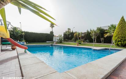 Swimming pool of House or chalet for sale in  Almería Capital  with Air Conditioner and Swimming Pool