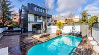 Swimming pool of Single-family semi-detached for sale in  Madrid Capital  with Swimming Pool