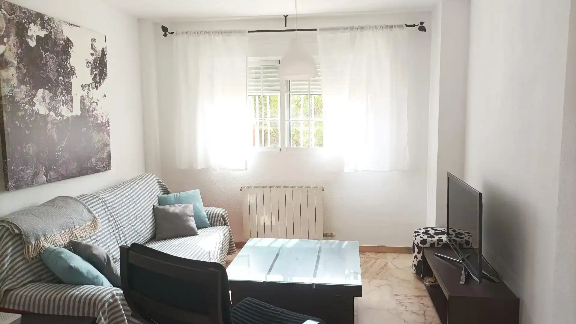 Sala de estar de Casa o chalet para compartir en Pulianas con Aire acondicionado, Jardín privado y Trastero