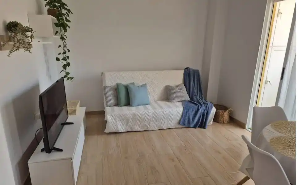 Sala de estar de Apartamento de alquiler en Torrevieja con Aire acondicionado, Calefacción y Parquet