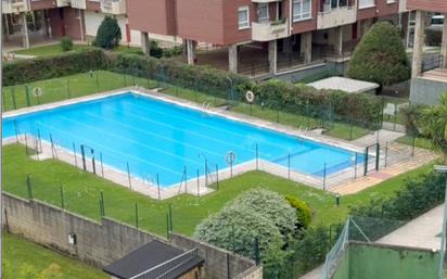 Swimming pool of Flat to rent in Castro-Urdiales  with Heating, Private garden and Parquet flooring