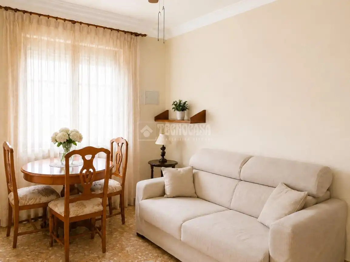 Sala d'estar de Casa adosada en venda en Málaga amb Terrassa i Traster
