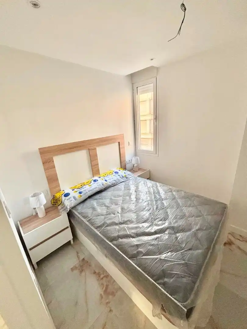 Dormitori de Apartament de lloguer en Murcia amb Aire condicionat, Moblat i Rentadora