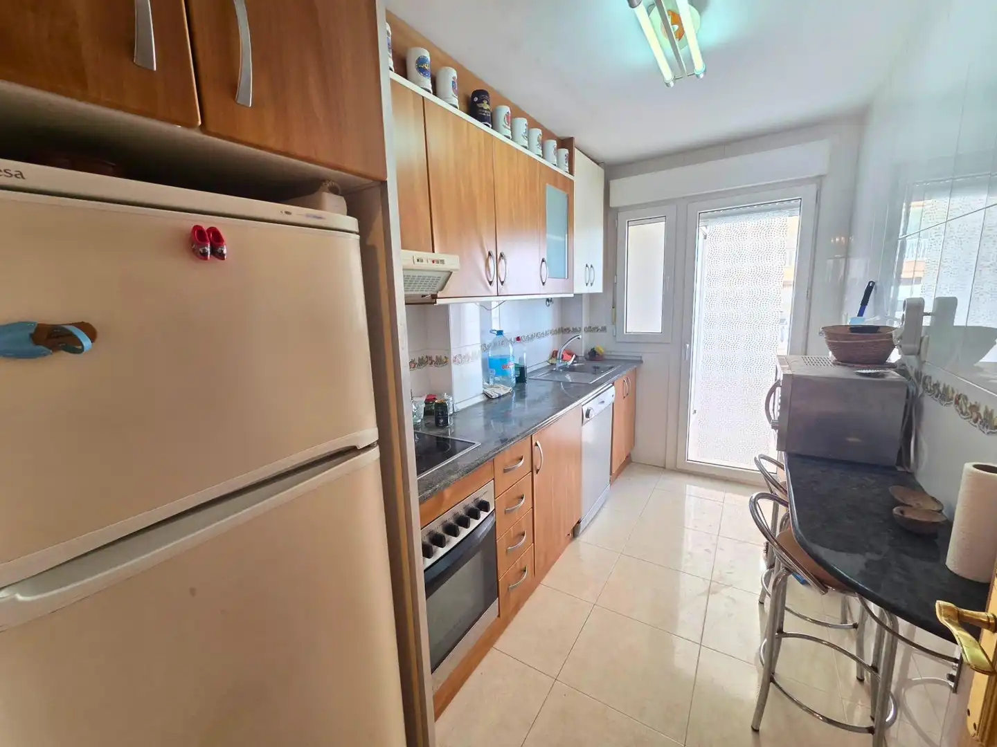 Küche von Wohnung zum Verkauf in La Manga del Mar Menor mit Klimaanlage, Heizung und Terrasse