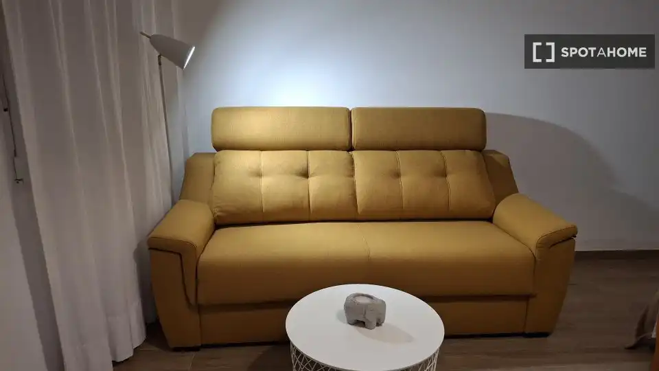 Sala d'estar de Apartament per a compartir en Llíria amb Aire condicionat, Terrassa i Moblat