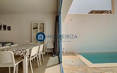 Exterior view of Single-family semi-detached for sale in Sant Josep de sa Talaia  with Air Conditioner, Terrace and Swimming Pool