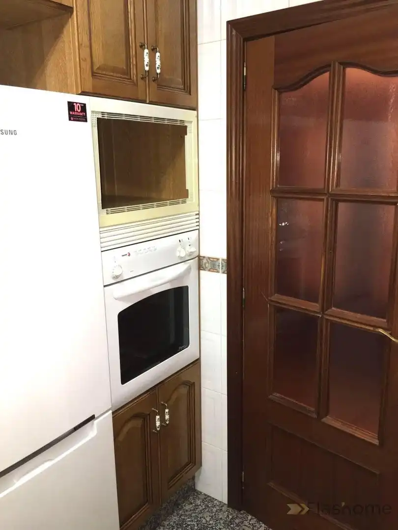 Küche von Wohnung zum Verkauf in Santa Amalia mit Klimaanlage, Heizung und Terrasse