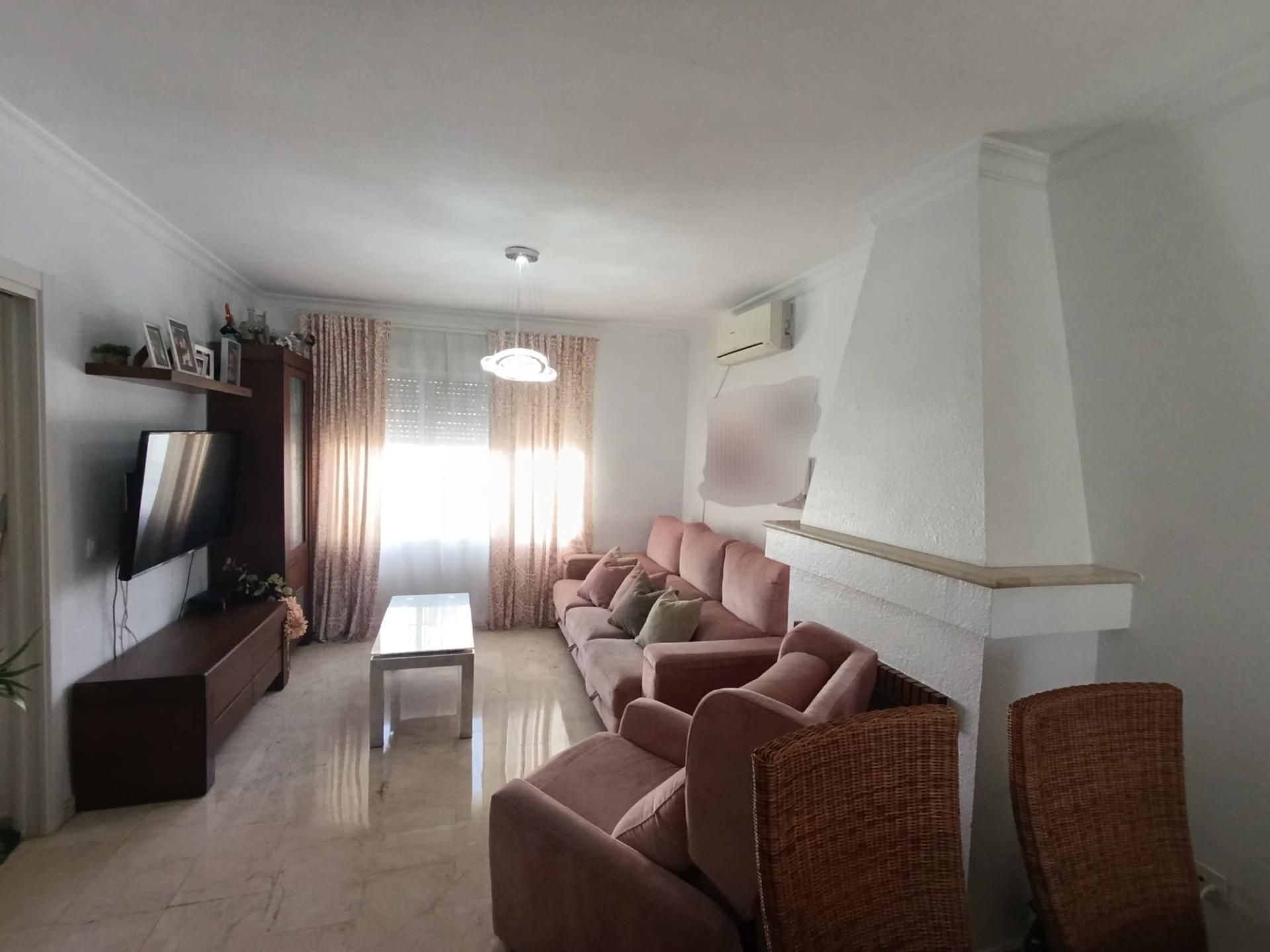 Sala d'estar de Pis en venda en Bollullos de la Mitación amb Aire condicionat, Jardí privat i Terrassa