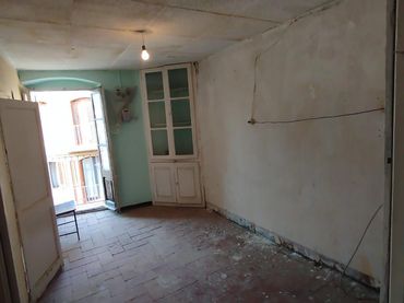 Adossat amb balcó en venda a de la Creu