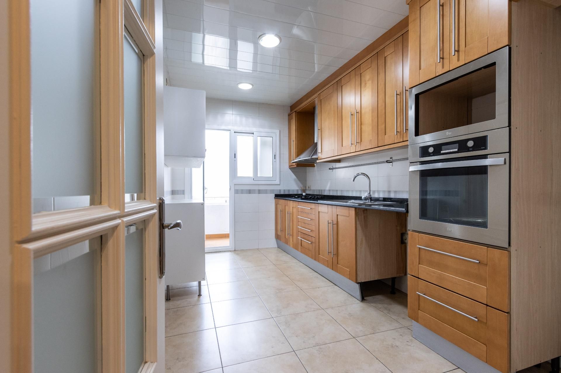 Kitchen of Flat for sale in Sabadell  with Air Conditioner and Balcony