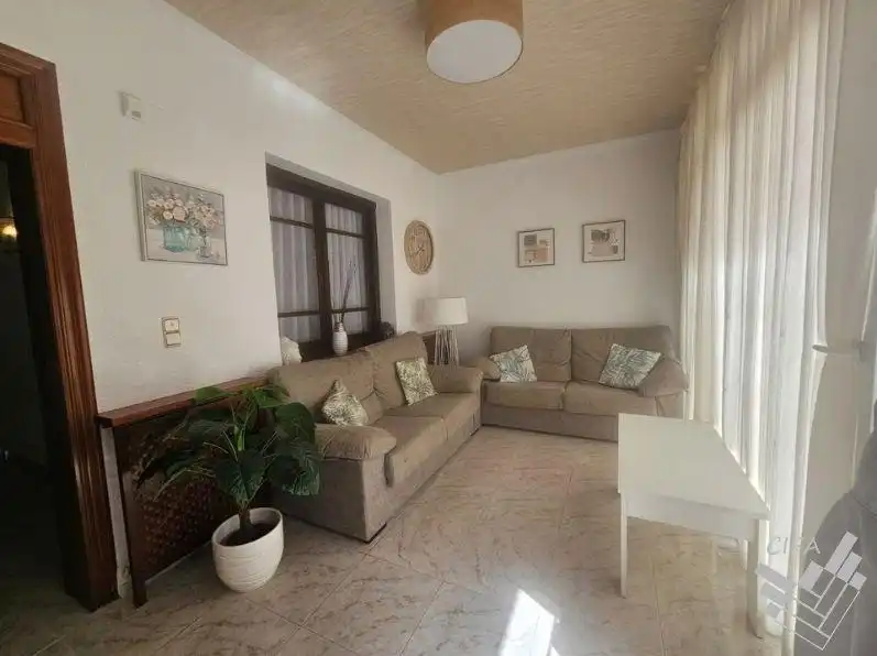 Sala de estar de Casa adosada en venta en Vinaròs con Aire acondicionado, Calefacción y Terraza