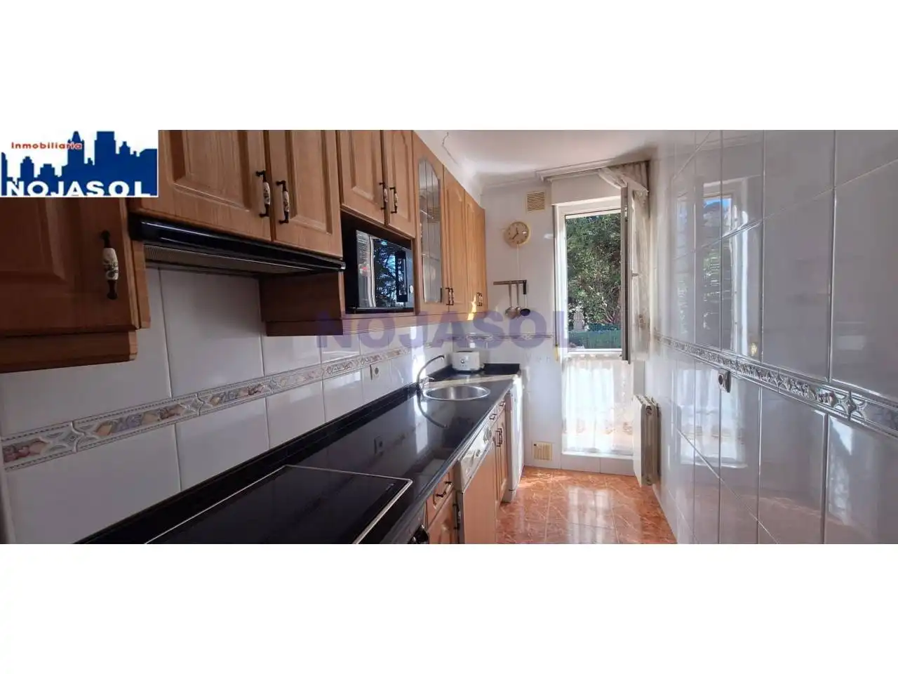 Cuina de Apartament de lloguer en Noja amb Calefacció, Terrassa i Moblat