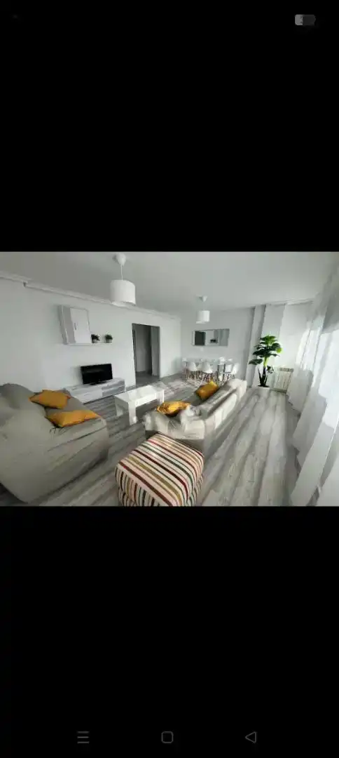 Sala d'estar de Pis de lloguer en Granada amb Aire condicionat, Jardí privat i Moblat