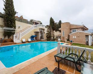 Swimming pool of House or chalet for sale in  Granada Capital  with Air Conditioner, Heating and Private garden