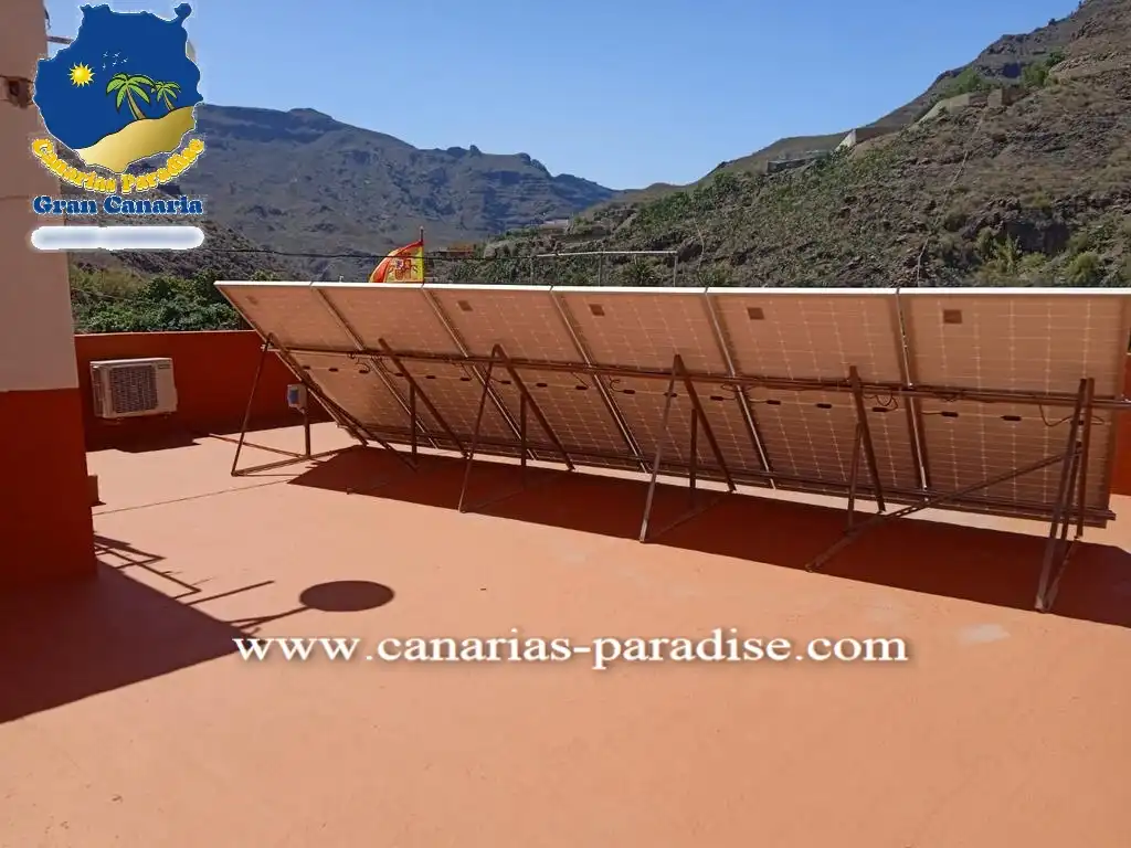 Terrasse von Einfamilien-Reihenhaus zum Verkauf in Mogán mit Klimaanlage, Privatgarten und Möbliert