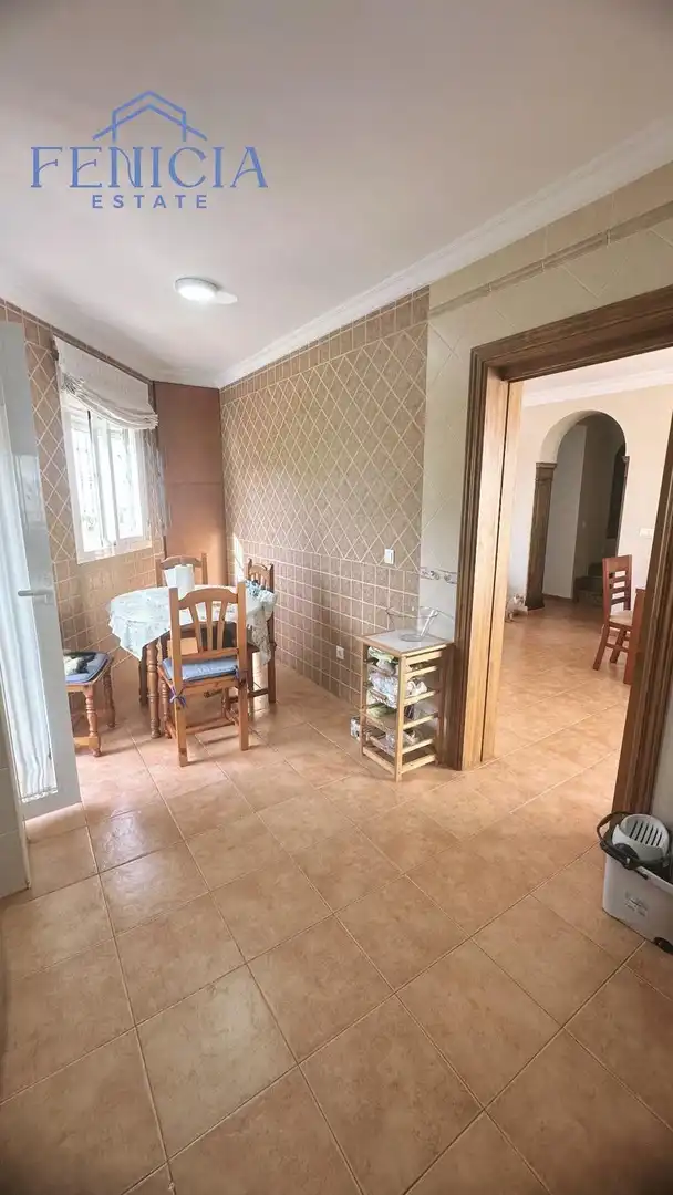 Comedor de Casa adosada en venta en Nerja con Jardín privado, Terraza y Piscina comunitaria