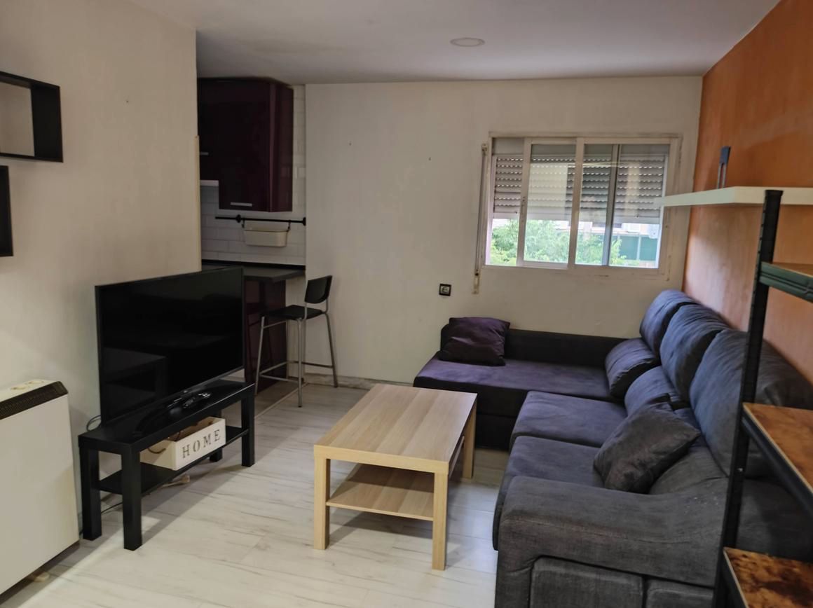 Sala d'estar de Dúplex en venda en  Madrid Capital amb Calefacció, Parquet i Moblat