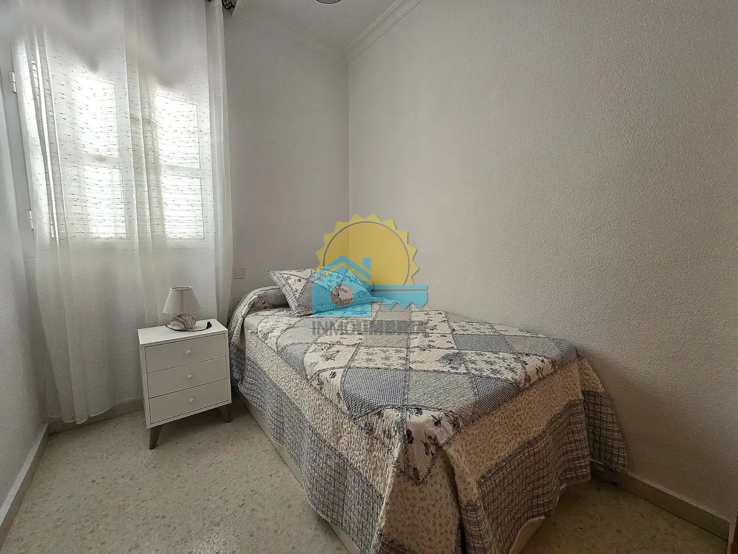Habitación de Casa adosada en venta en Punta Umbría con Terraza, Balcón y Piscina comunitaria