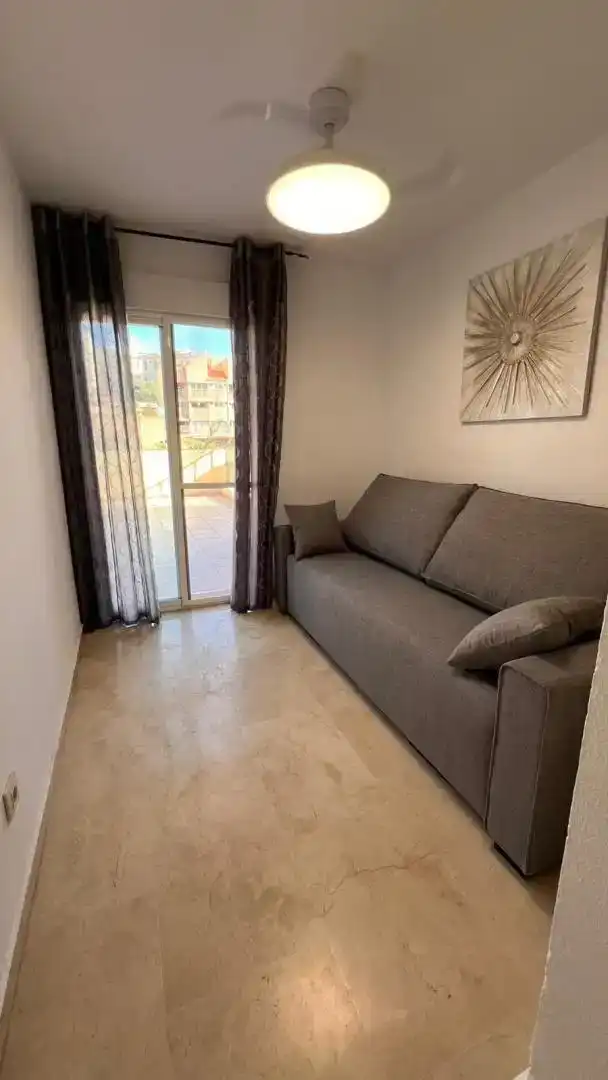 Sala de estar de Dúplex de alquiler en Calpe / Calp con Aire acondicionado, Jardín privado y Parquet