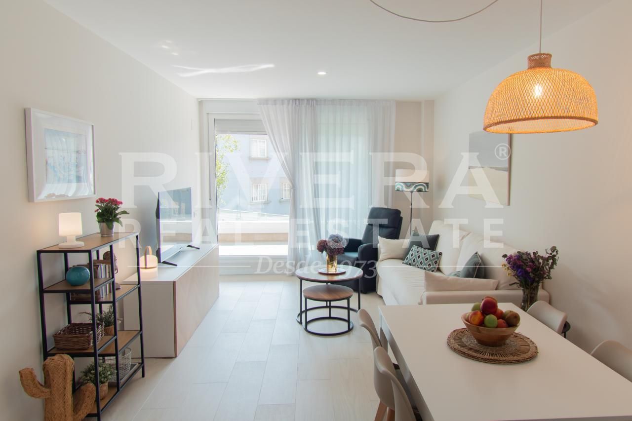 Sala de estar de Piso en venta en Sanxenxo con Calefacción, Terraza y Trastero