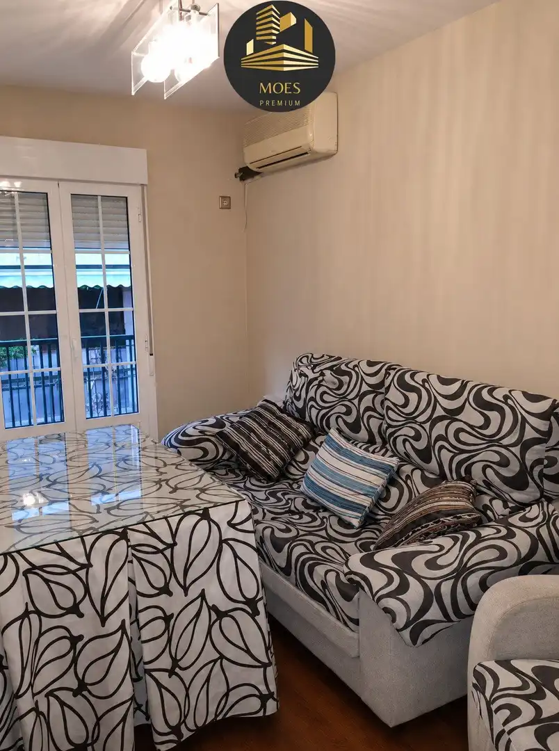 Living room of Flat for rent in Jaén  with Air Conditioner and Parquet flooring