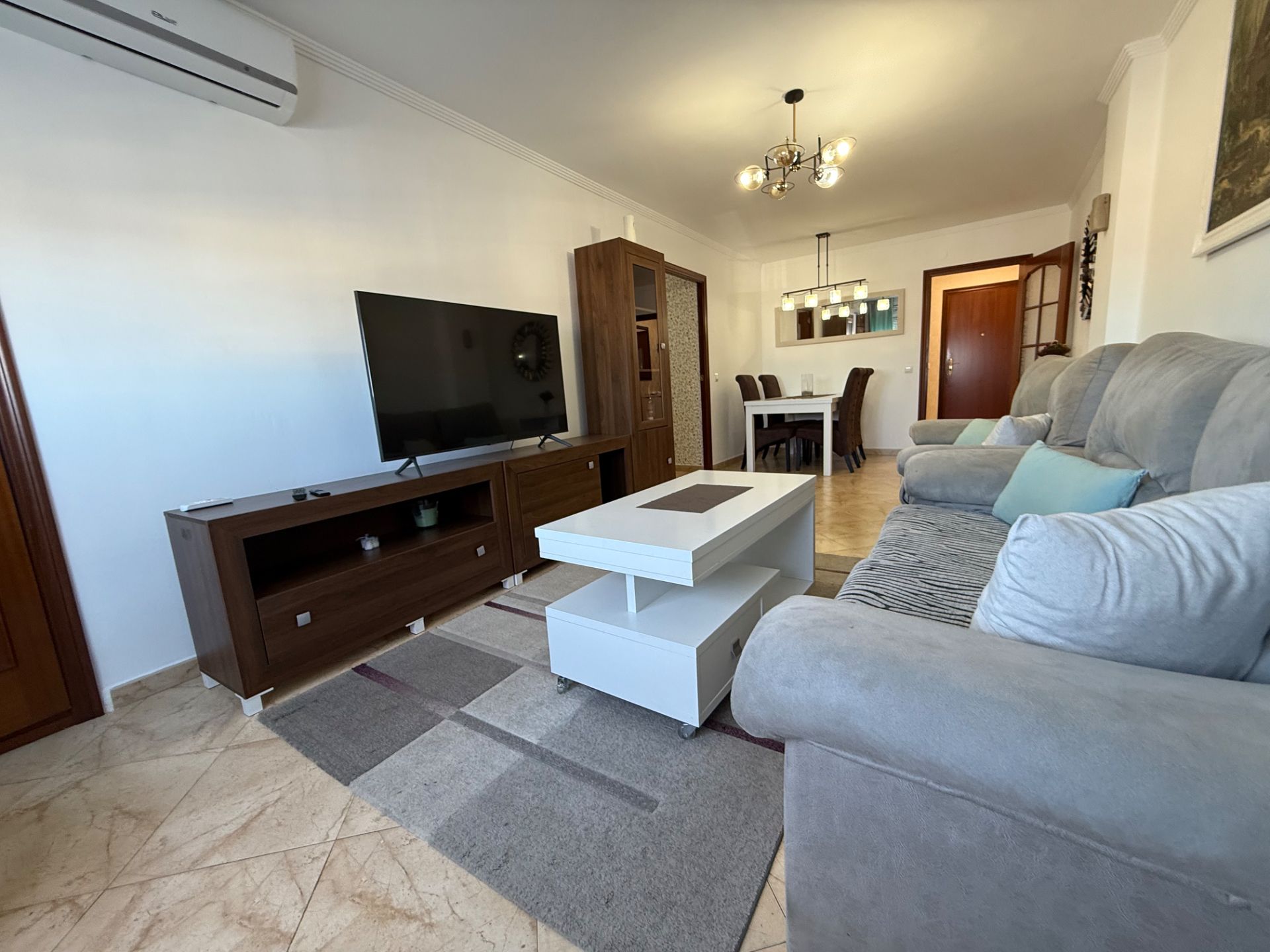 Sala d'estar de Pis en venda en  Huelva Capital amb Aire condicionat i Moblat