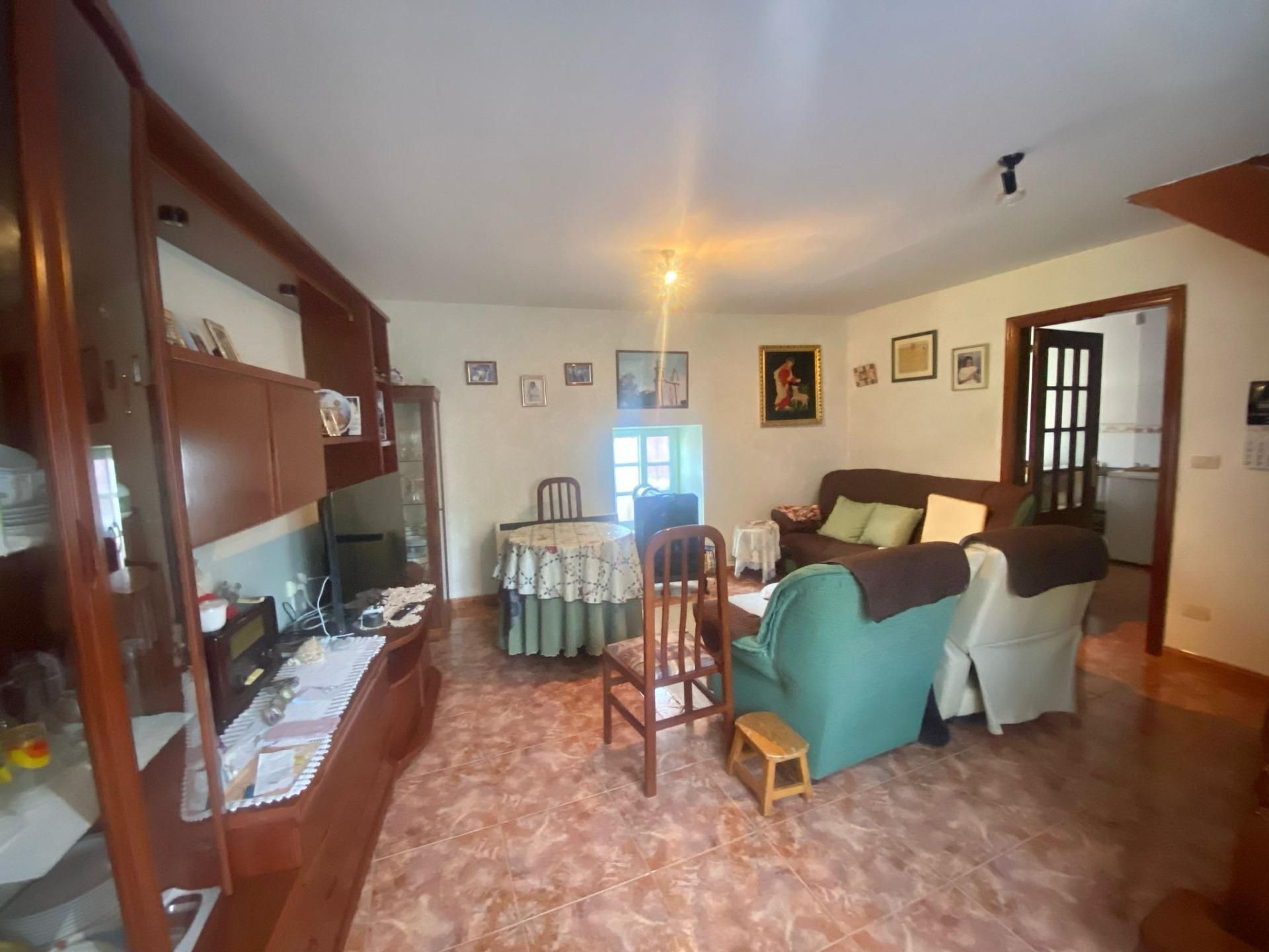 Sala d'estar de Casa adosada en venda en Nigrán amb Calefacció, Jardí privat i Terrassa