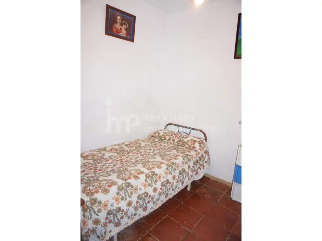 Habitación de Casa adosada en venta en Benamocarra con Jardín privado, Terraza y Amueblado