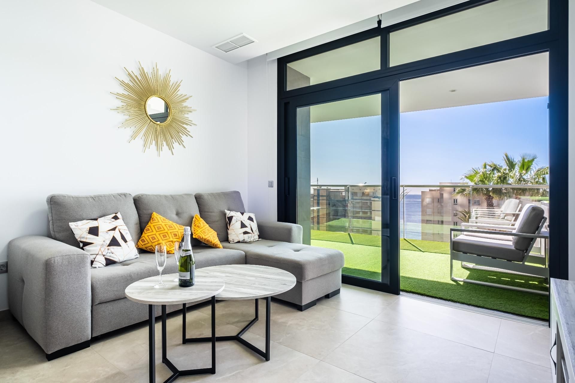 Sala d'estar de Apartament en venda en Benidorm amb Aire condicionat, Calefacció i Jardí privat