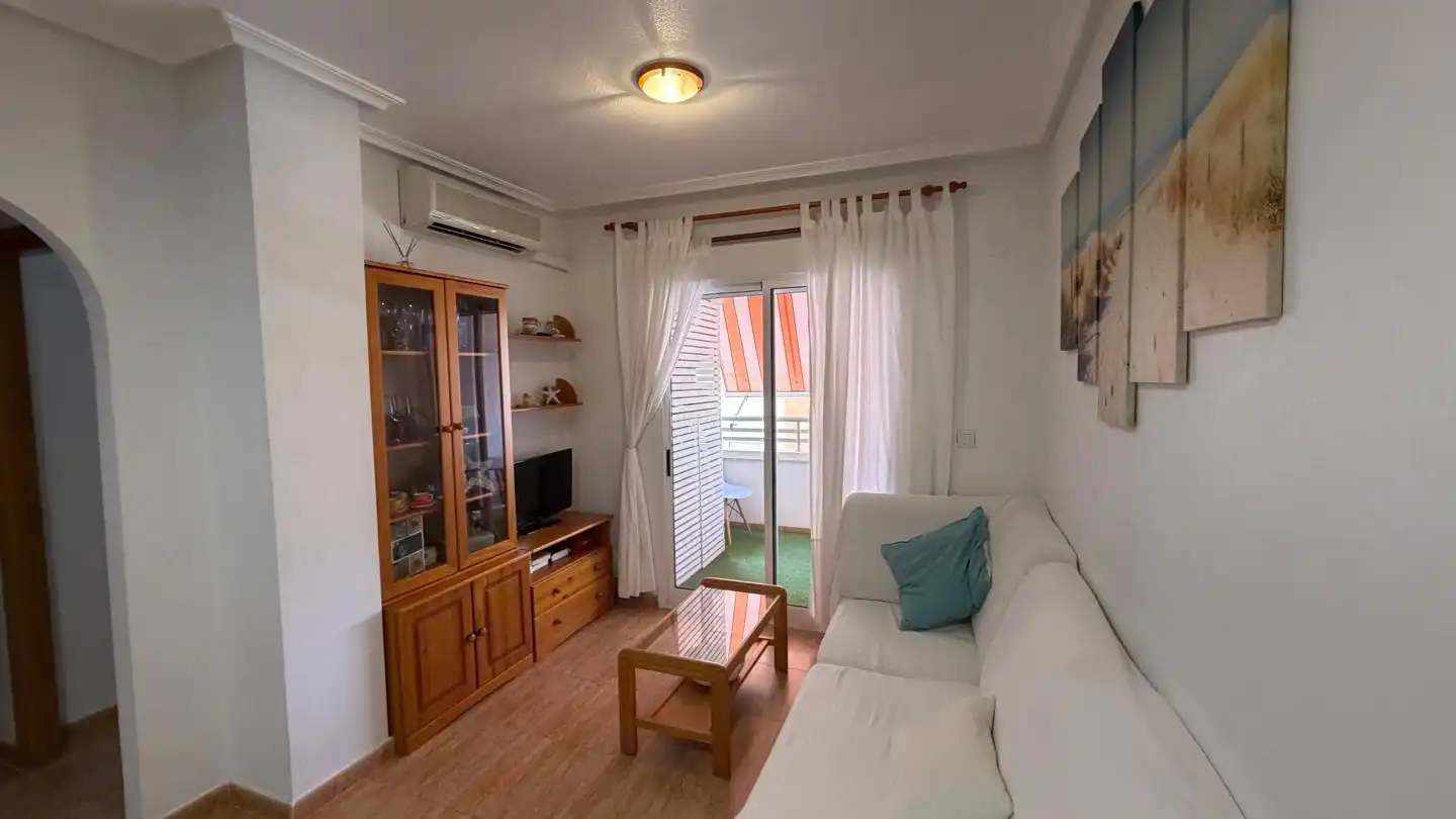 Sala de estar de Apartamento en venta en La Manga del Mar Menor con Aire acondicionado, Terraza y Piscina