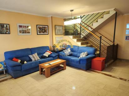 Sala d'estar de Casa o xalet en venda en San Andrés del Rabanedo amb Calefacció, Jardí privat i Terrassa