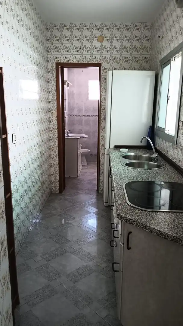 Kitchen of Houses for sale in Brenes  with Swimming Pool