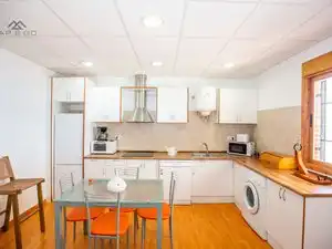 Cuina de Casa o xalet de lloguer en Almuñécar amb Aire condicionat, Jardí privat i Terrassa