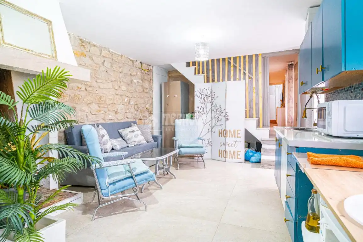 Sala d'estar de Casa adosada en venda en Úbeda amb Aire condicionat i Calefacció