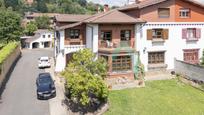 Vista exterior de Casa adosada en venda en Langreo amb Calefacció, Jardí privat i Parquet