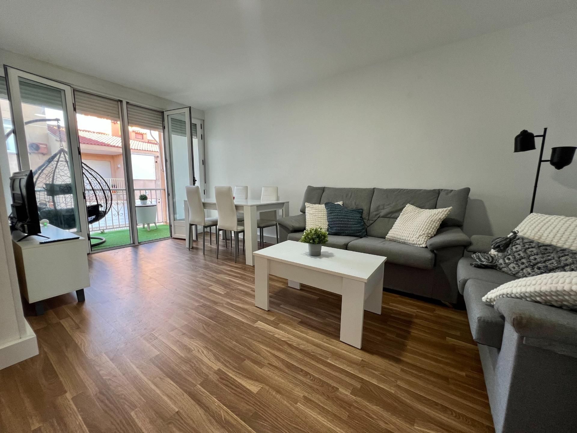 Sala d'estar de Apartament en venda en La Manga del Mar Menor amb Aire condicionat i Balcó