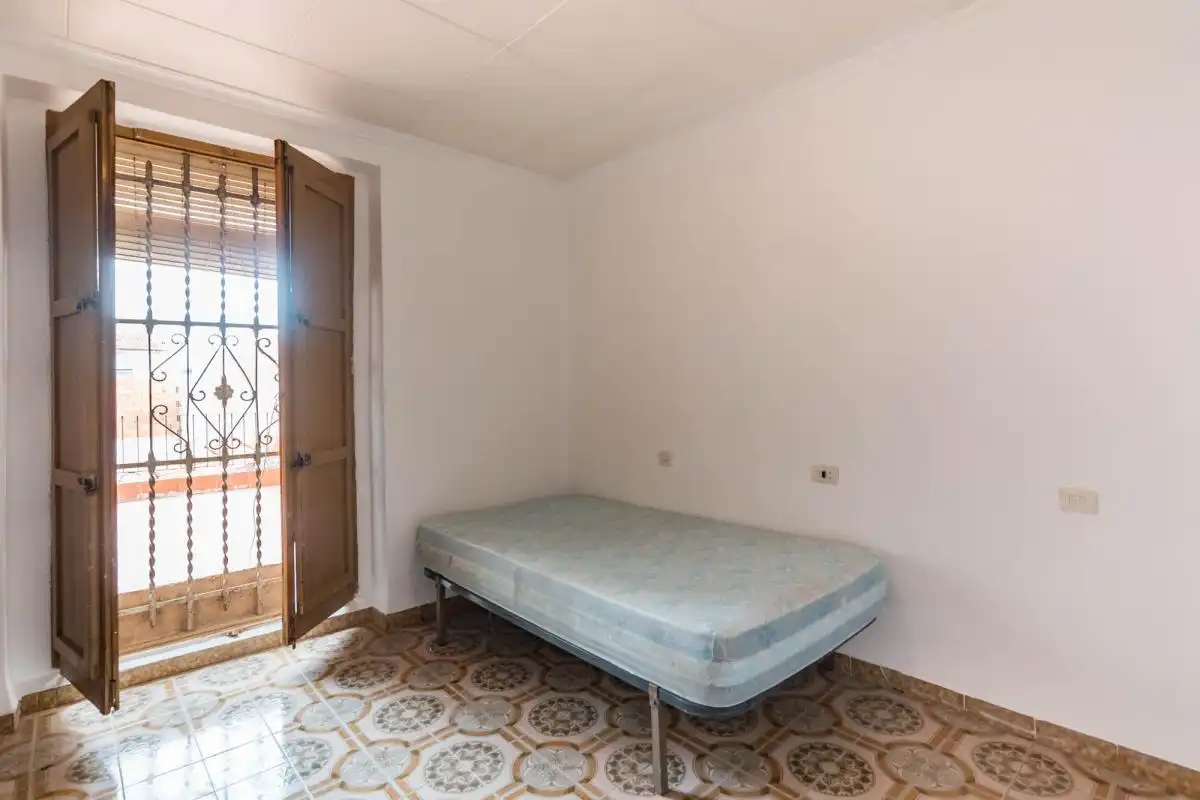 Habitación de Casa adosada en venta en Murcia con Aire acondicionado, Calefacción y Jardín privado