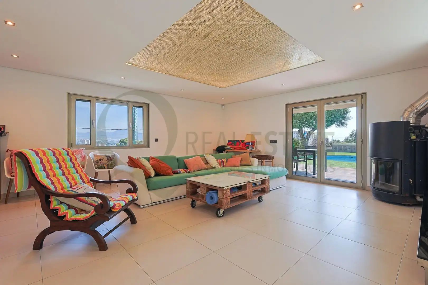 Sala d'estar de Casa o xalet en venda en Alicante / Alacant amb Aire condicionat, Calefacció i Jardí privat