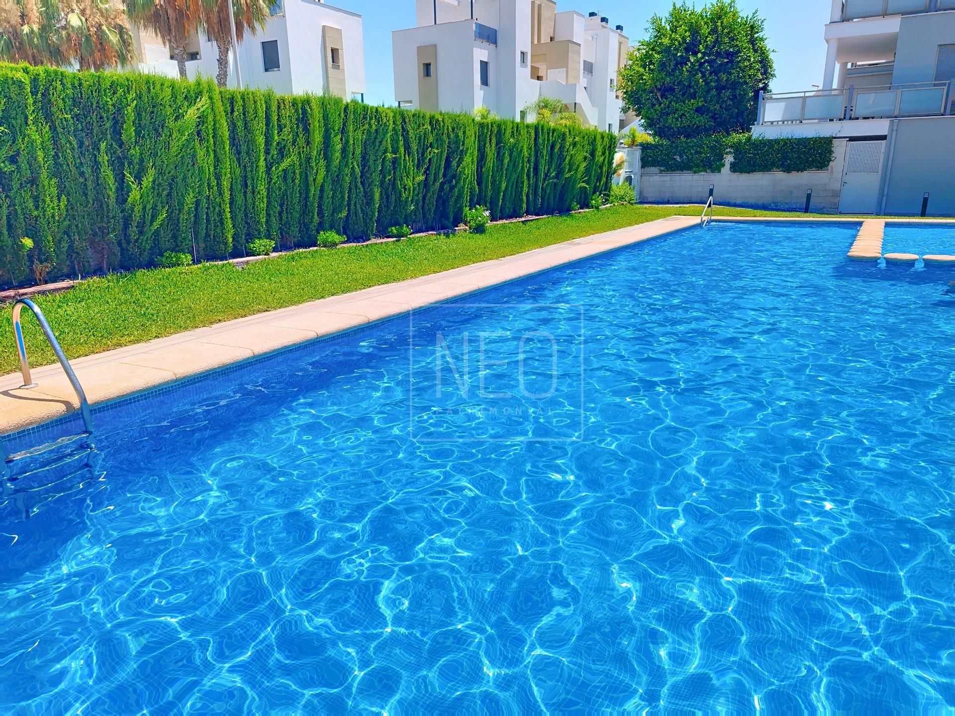 Piscina de Dúplex en venda en Oliva amb Aire condicionat, Jardí privat i Terrassa