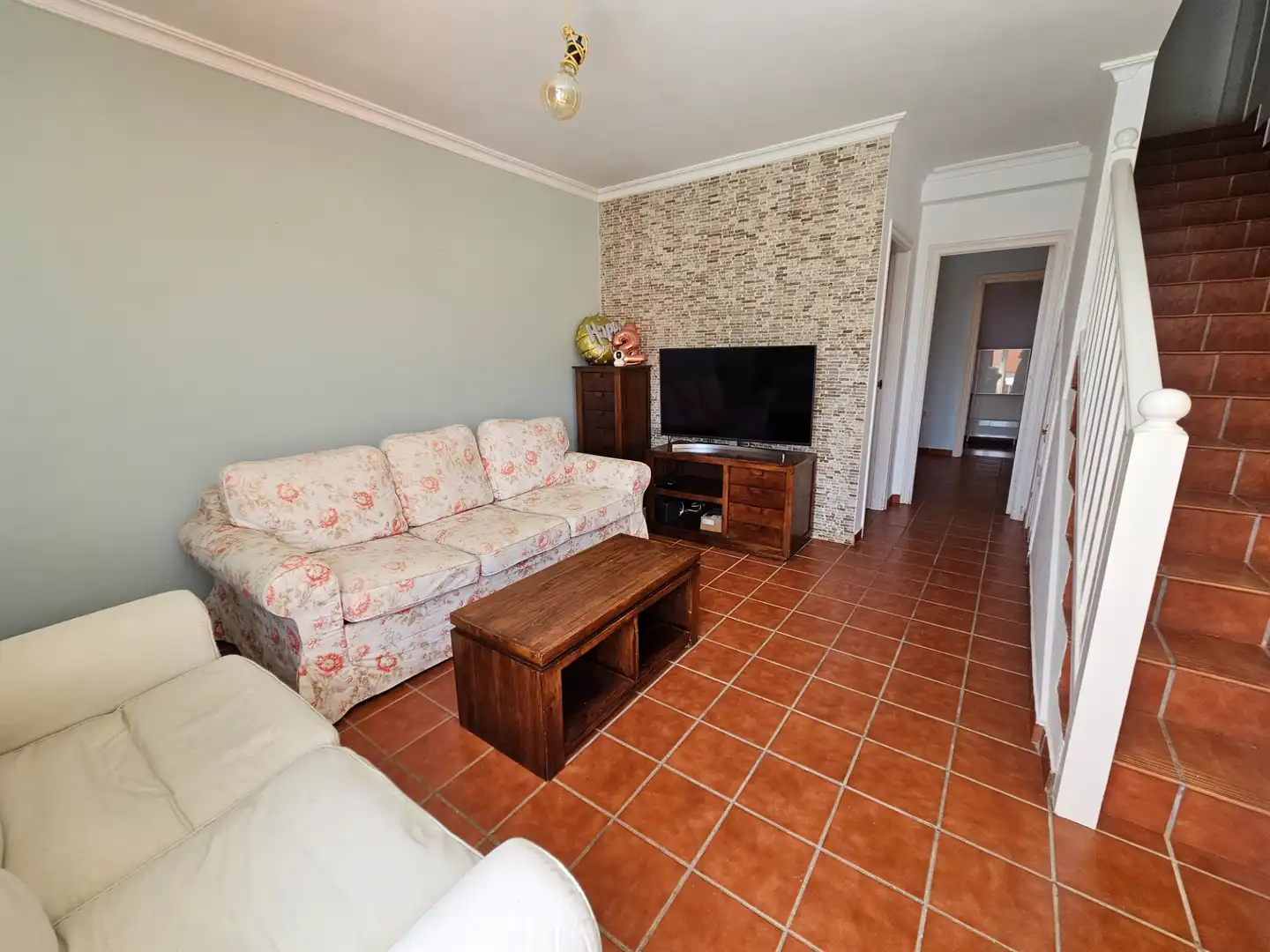 Sala d'estar de Casa adosada en venda en Puerto del Rosario amb Aire condicionat, Jardí privat i Terrassa
