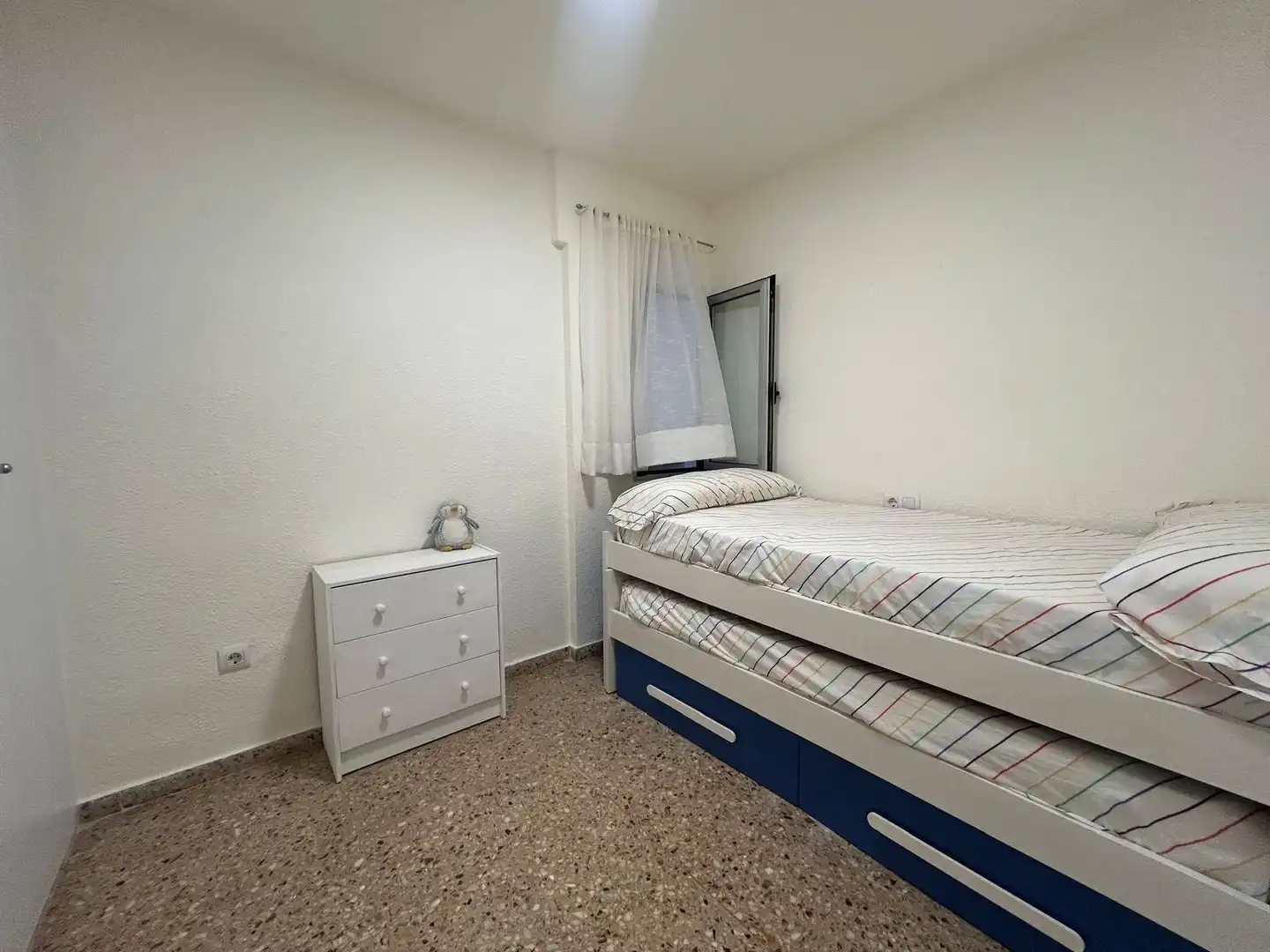 Dormitori de Apartament de lloguer en La Pobla de Farnals amb Moblat i Piscina comunitària
